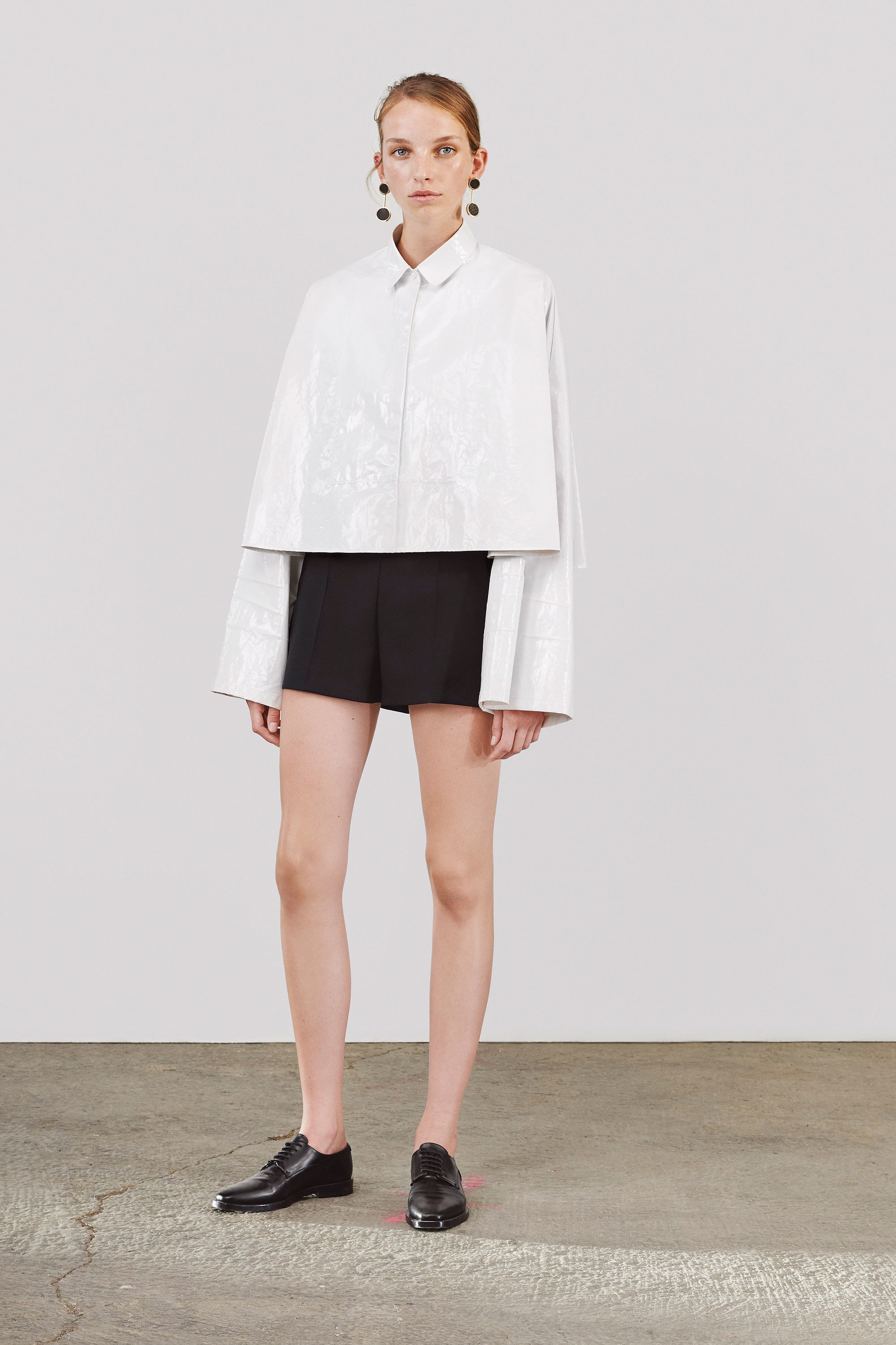 Jil Sander Collection white shirt black shorts summer outfit